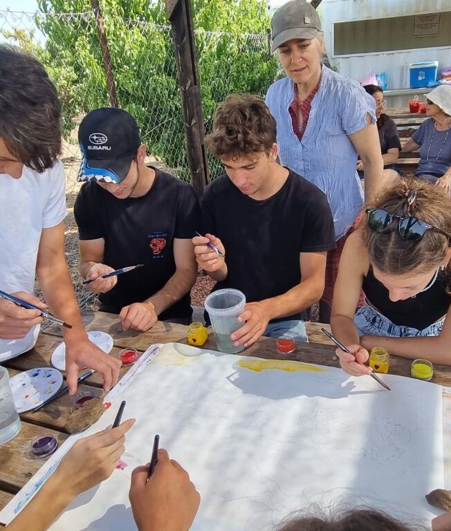 a group of kids in art class